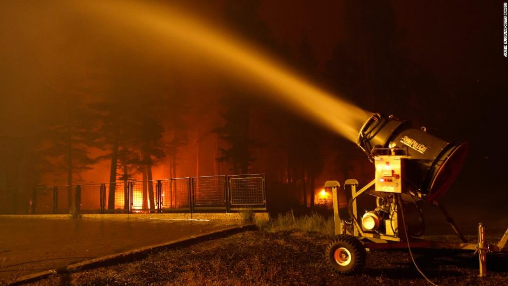 Lake Tahoe ski resorts are using snow blowers to help fight flames from the Caldor Fire